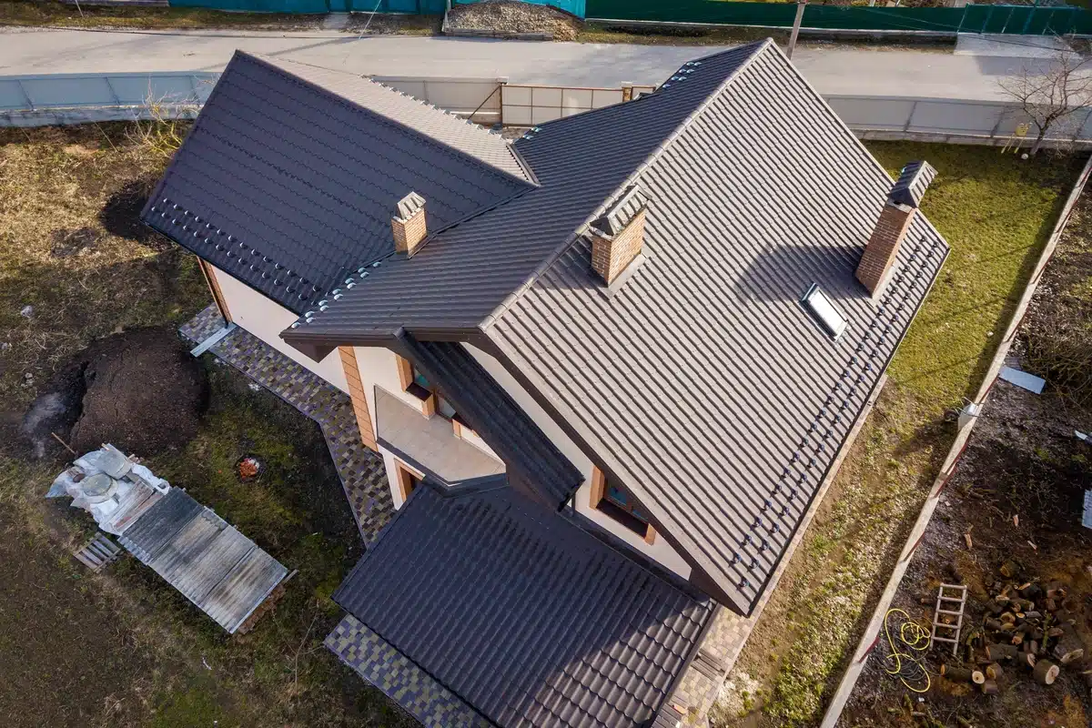 birds eye view of a home with a metal roof