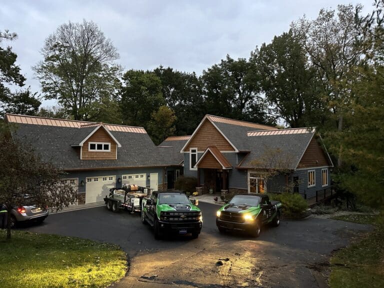 Shingle roofing installed with a copper metal ridge installed by SMR Home Pros in Michigan