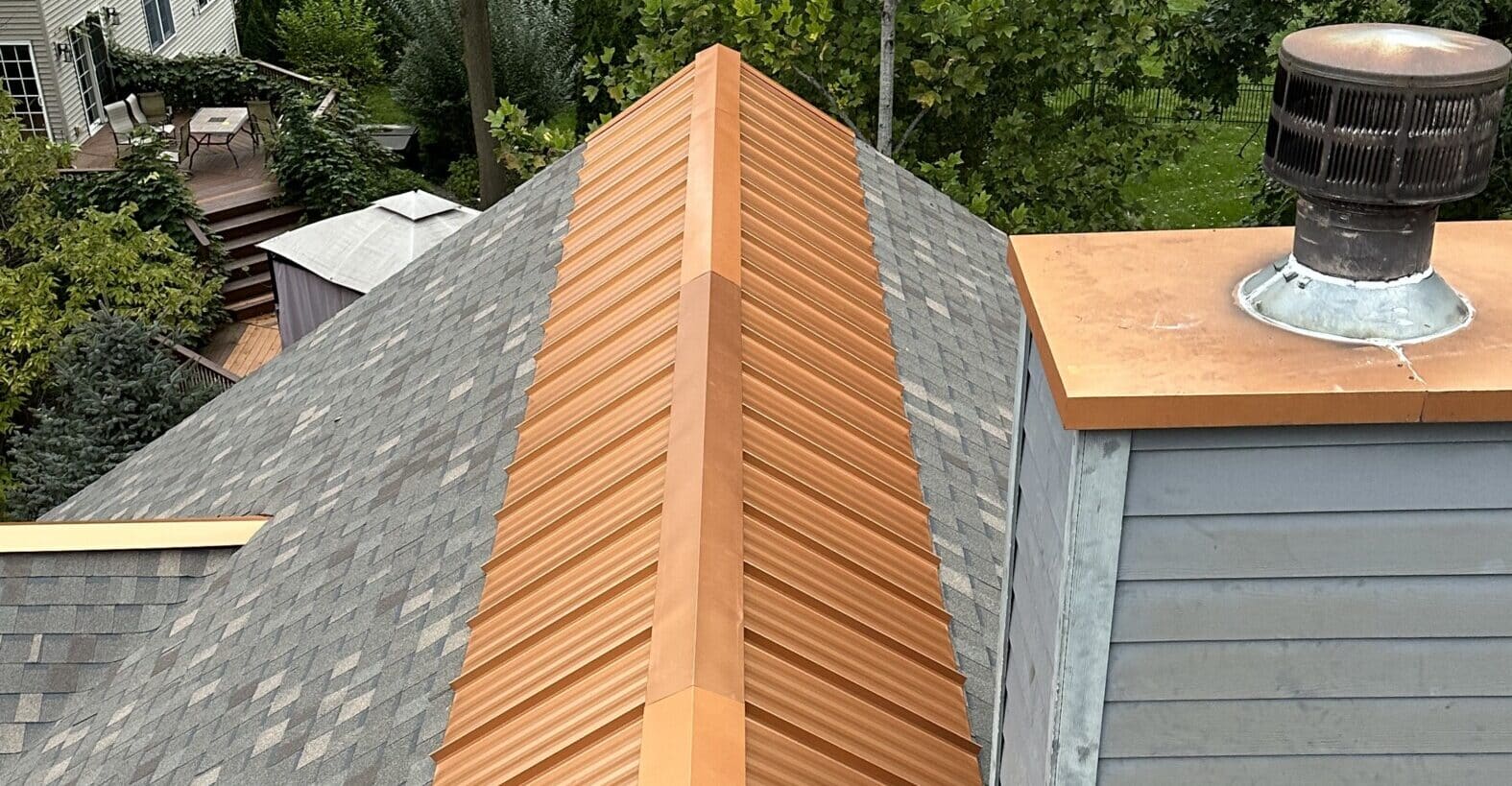 Copper ridge cap installed by SMR Home Pros