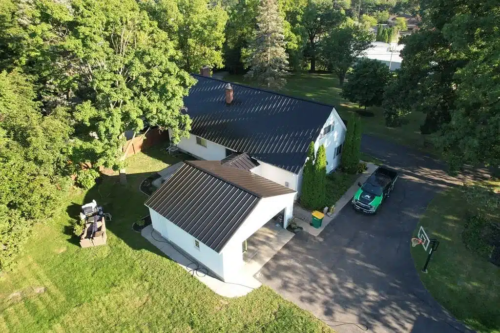 standing seam metal roof replaced by shingle and metal roof