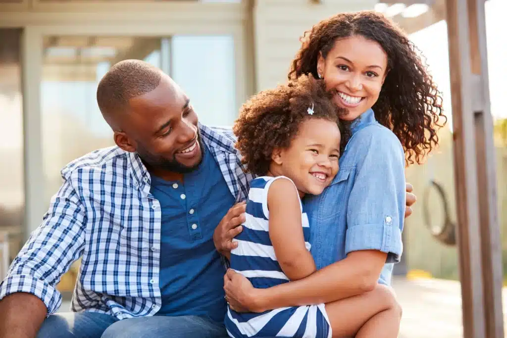 happy black family enjoying time outside