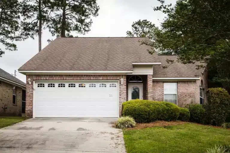 brick wall house requiring roof repair