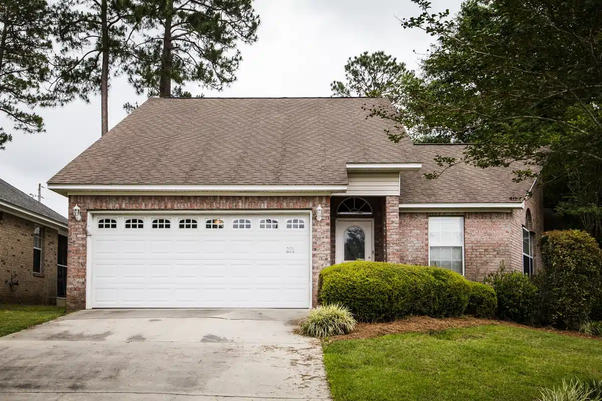 brick wall house requiring roof repair