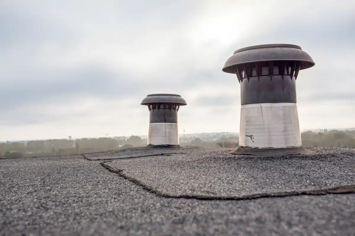 asphalt shingle roof with two ventilation system on