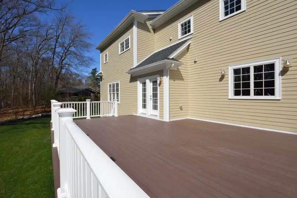 residential home with vinyl window replacement from old wooden designs