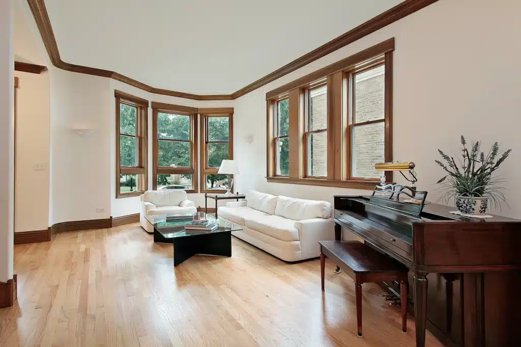 wooden windows installed in stylish living area of home