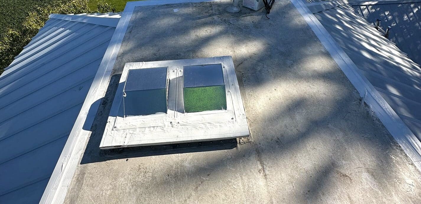 Flashing work done by shingle and metal roof during a metal roofing replacement