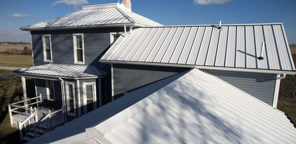 After SMR Home Pros completed a complete home improvement project featuring standing seam metal, custom windows and vinyl siding.