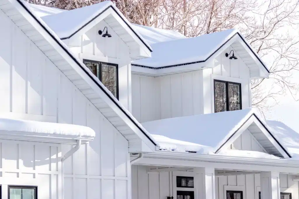 board and batten siding on house in winter