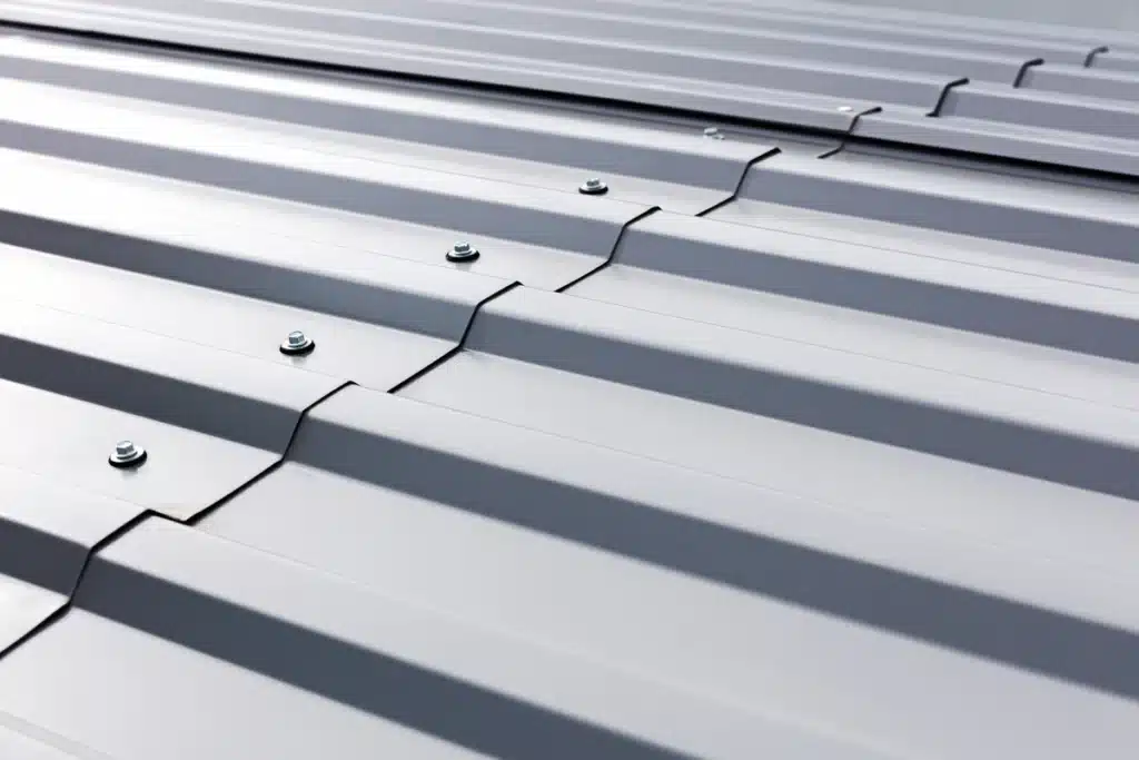 metal screws - close up of screws on a metal roof