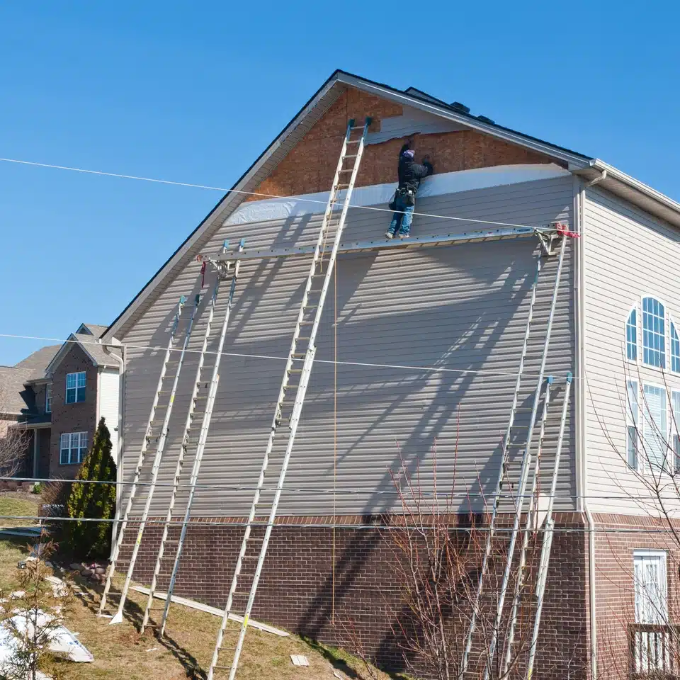 pros replace siding-construction materials being used to repair or replace siding on a home