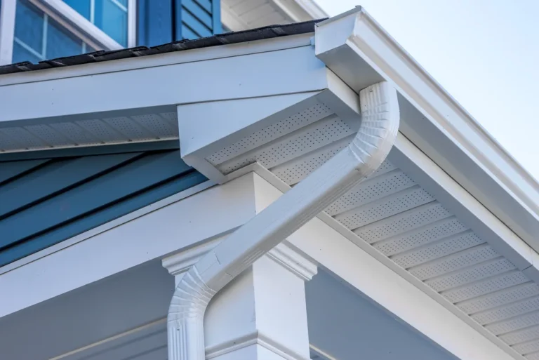 a newly installed gutter system on a house