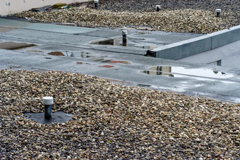 a newly installed tar and gravel roof