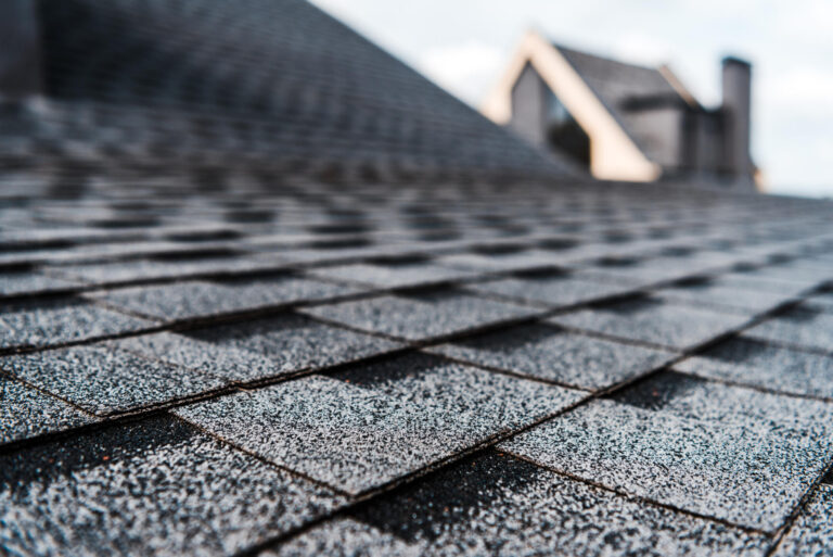 impact resistant shingles-close up image of dark shingles on a home roof