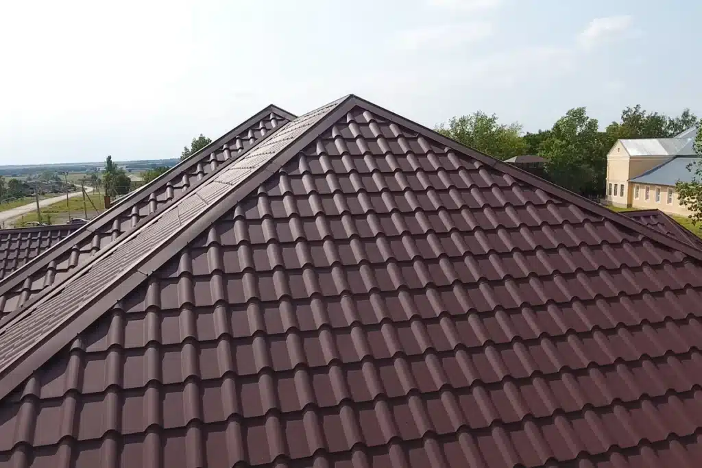 brown metal tile roof of house-metal roofing put in bay