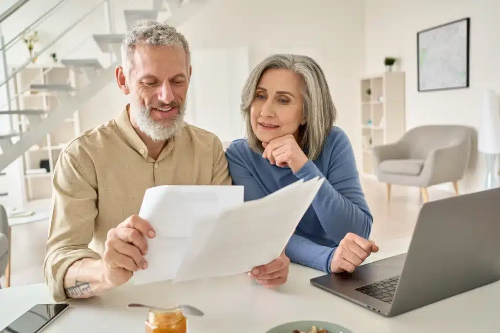 retired couple reviewing documents