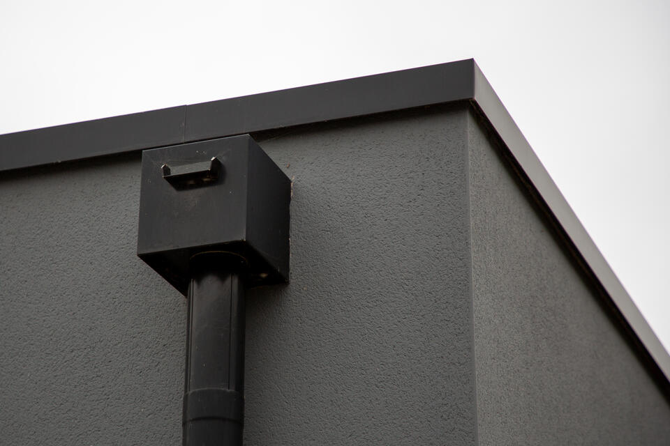 roof scupper-external image of roof scupper drainage system on building with flat roof
