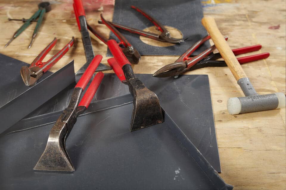 roofing tools-close up view of a collection of hand held roofing tools