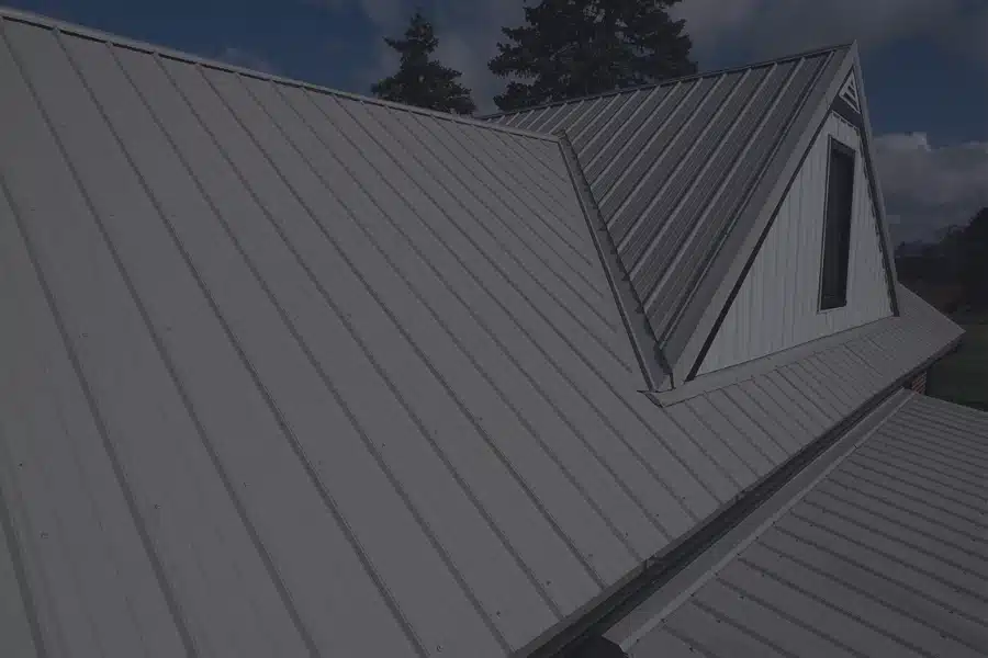 Beautiful metal roofing replacement done in Polar White by SMR HomePros.