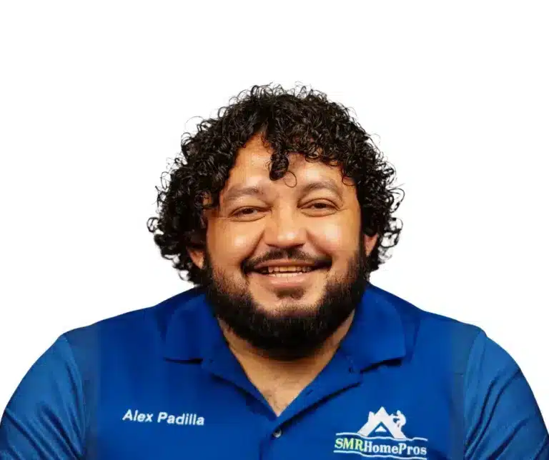 a smiling hispanic man with curly hair